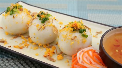  Bánh bao Sanmenxia: Món ăn tinh tế với lớp vỏ dẻo thơm hòa quyện cùng nhân thịt xá xíu đậm đà và nước sốt cay nồng!